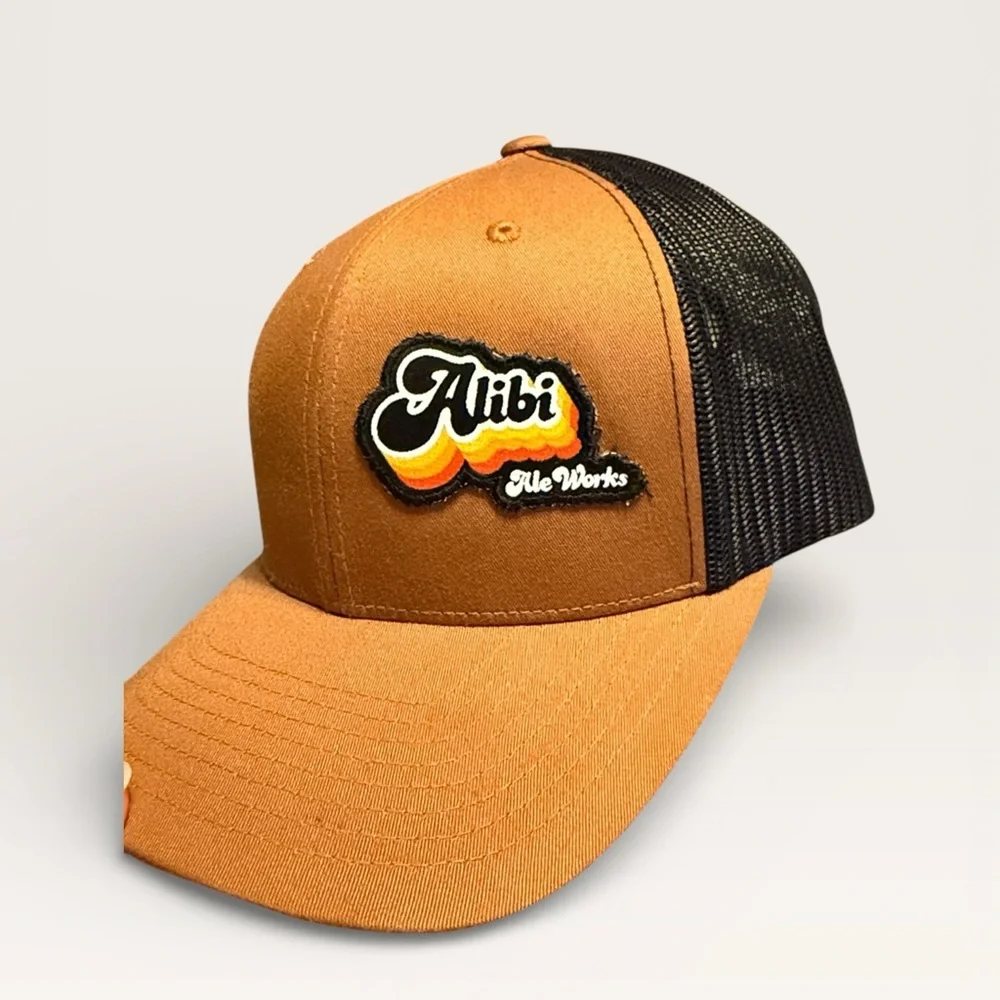 Alibi Ale Works Trucker Hat – Brown & Black Mesh (Adjustable)